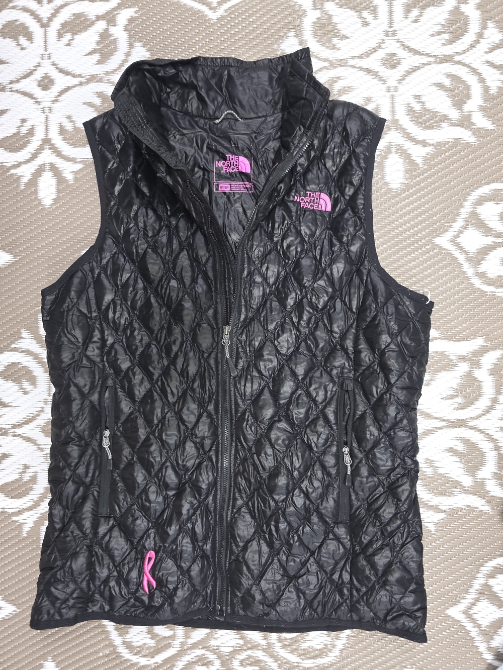 The North Face Black Quilted Vest with Pink Logo